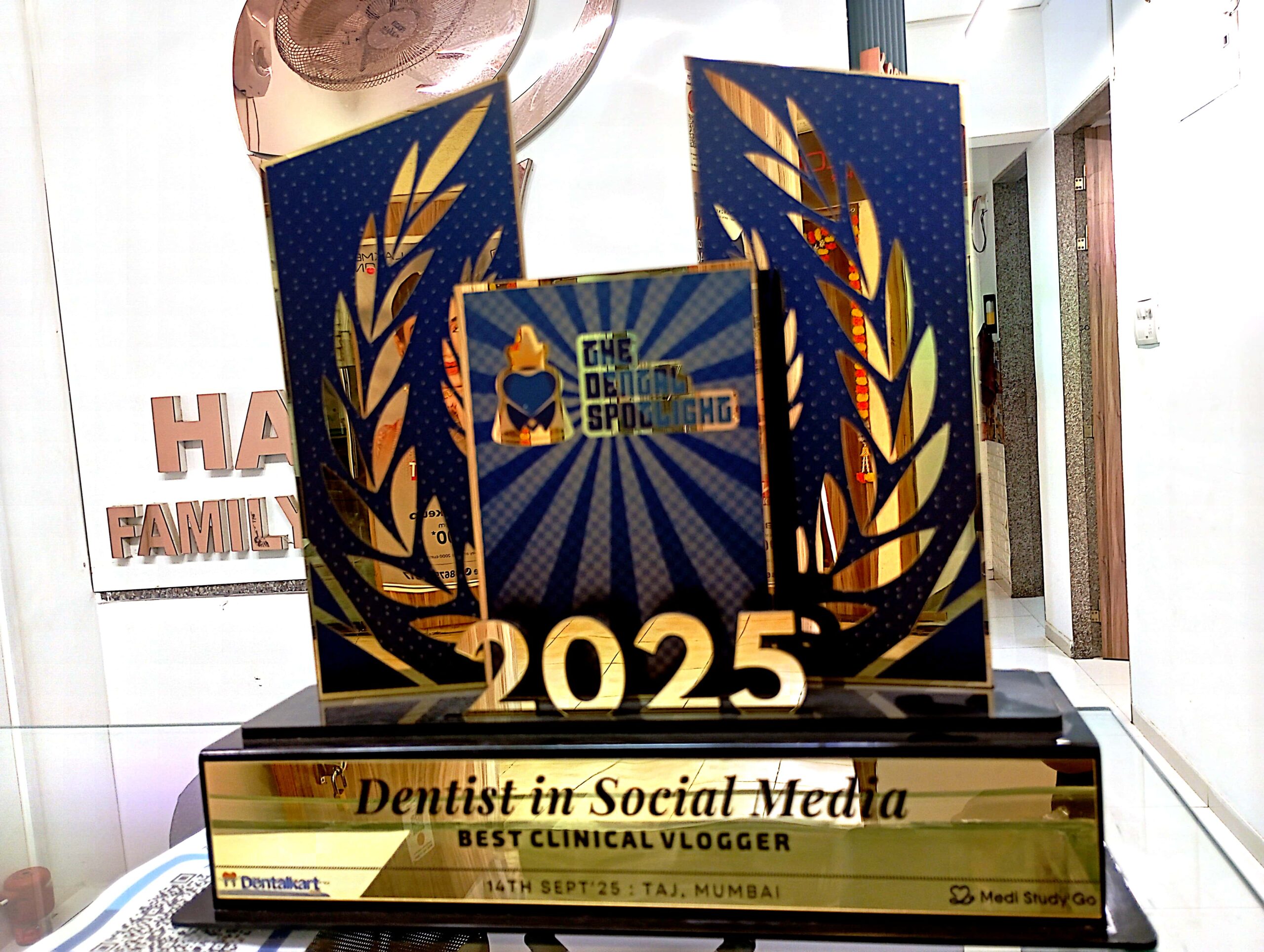 Award trophy presented to Dr. Hileri Mori for winning Best Clinical Vlogger at The Dental Spotlight Awards 2025 for impactful dental content creation and patient education.